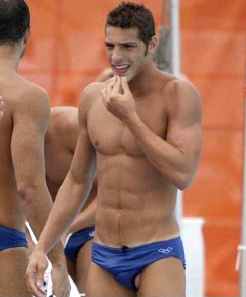 speedo with testicle hanging out 